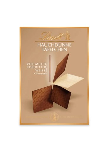 Шоколадні пластинки Lindt Hauchdünne Швейцарія темний, молочний, білий шоколад  125г 1шт